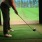 a person using a golf simulator