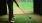 a person using a golf simulator