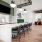 a spacious clubroom with a resident kitchen