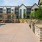 a spacious poolside grilling area