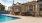 Resort-style swimming pool with lounge seating