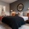 Bedroom with natural lighting and high ceilings